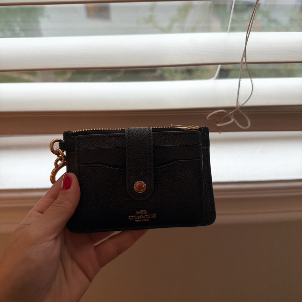 Coach Black Leather Wallet with Gold Accents